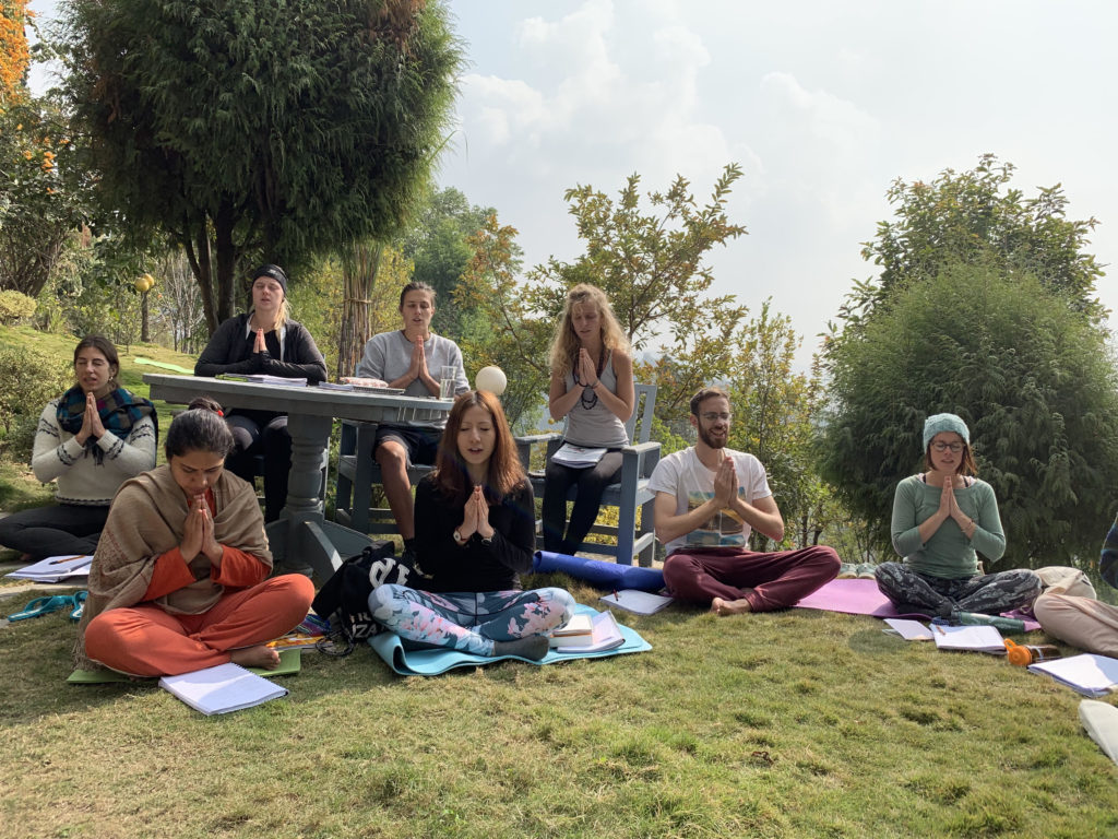 Learning Prayer outdoor in Nepal Yoga Academy 